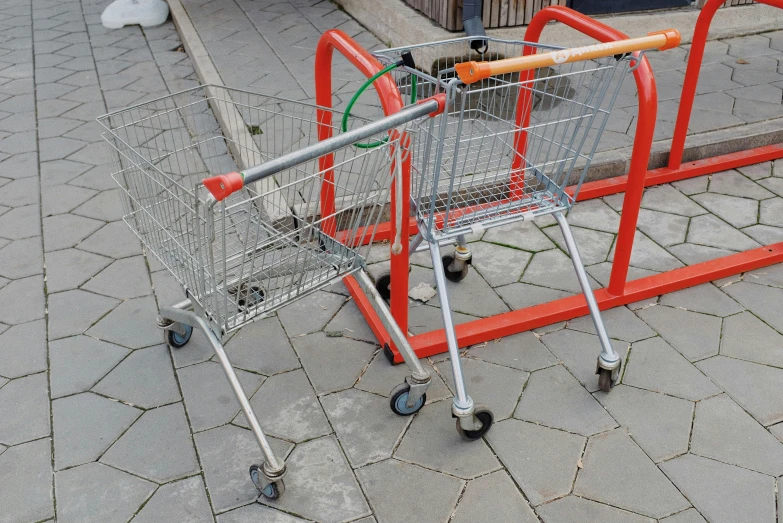 a shopping cart sitting on top of a sidewalk, arte povera, two crutches near bench, 15081959 21121991 01012000 4k, ernst haekel, square