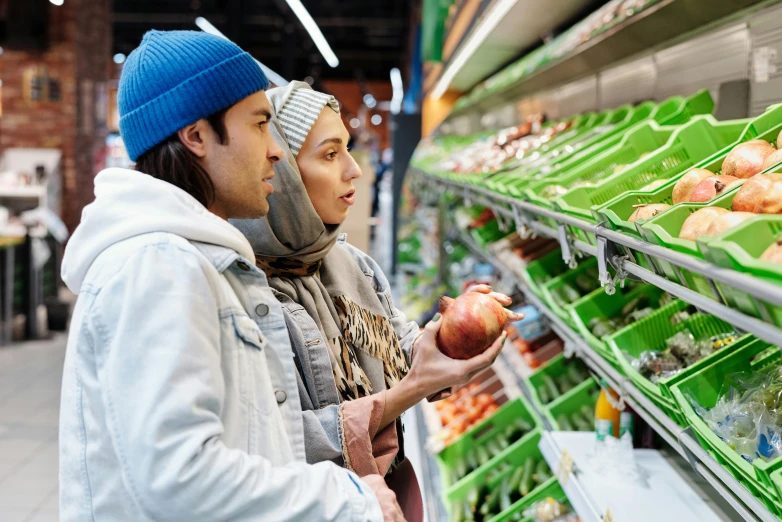 a man and woman shopping in a grocery store, shutterstock, renaissance, islamic, 🦩🪐🐞👩🏻🦳, australian, square