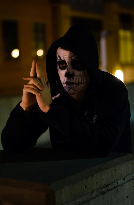 a man dressed as a skeleton smoking a cigarette, pexels contest winner, realism, wearing a black hoodie, ( ( theatrical ) ), scene from a movie, dark people discussing