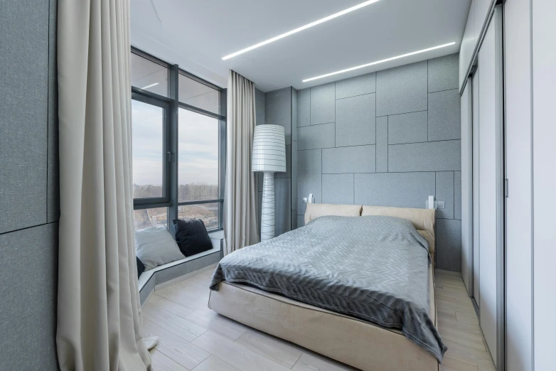 a bed sitting in a bedroom next to a window, by Adam Marczyński, pexels contest winner, flat grey color, luxury condo interior, led light strips, floor to ceiling window