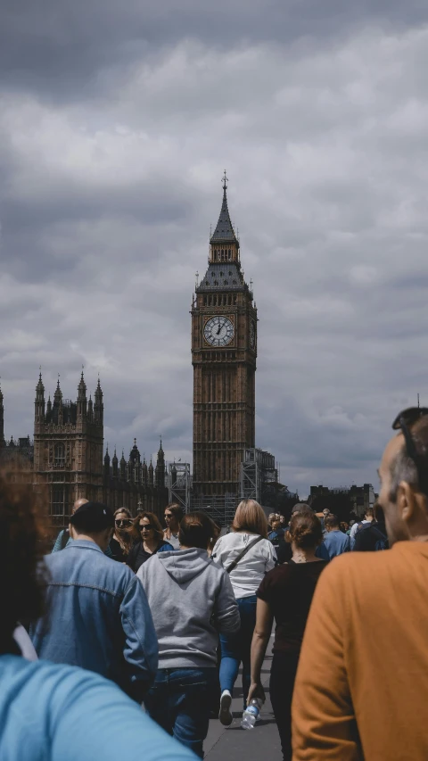 a crowd of people walking down a street with a clock tower in the background, by IAN SPRIGGS, pexels contest winner, renaissance, big ben, on a gray background, seen from afar, square