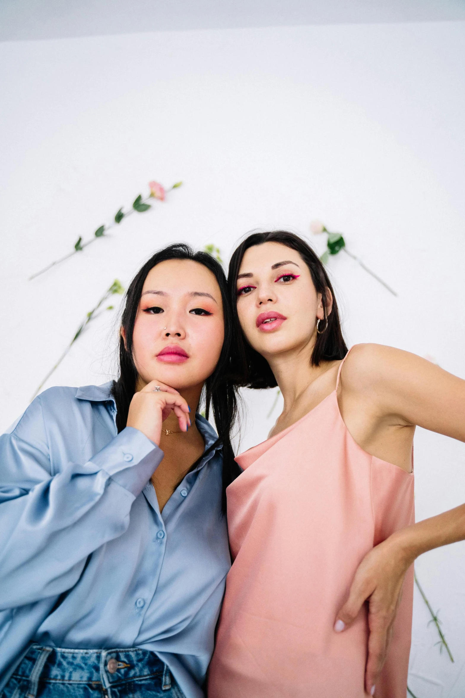 a couple of women standing next to each other, inspired by Wang Duo, trending on unsplash, aestheticism, studio shoot, blushing, selfie, mai anh tran