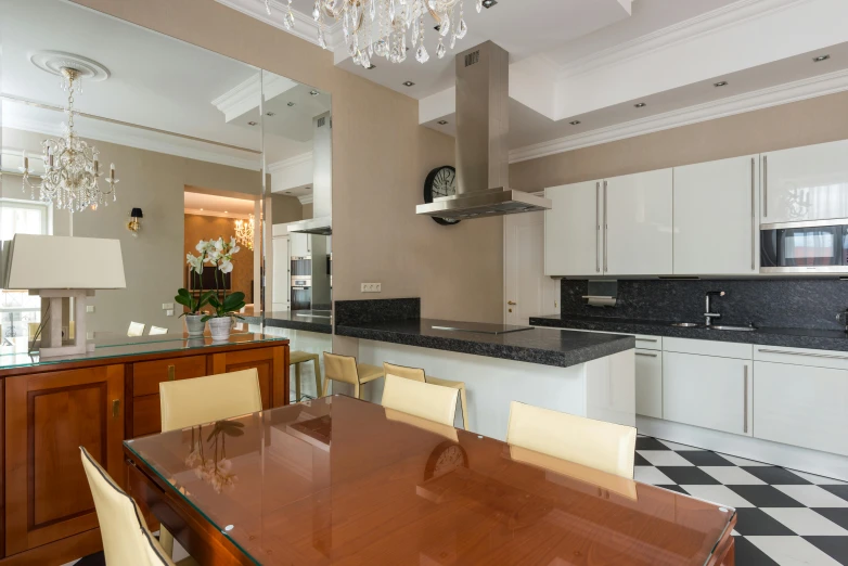 a kitchen with a black and white checkered floor, inspired by Albert Paris Gütersloh, luxury bespoke kitchen design, thumbnail, chandeliers, high details photo