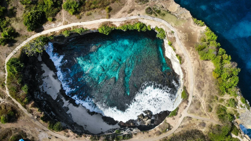 an aerial view of a large body of water, pexels contest winner, process art, grotto, big island, birdeye, ultrawide lens”