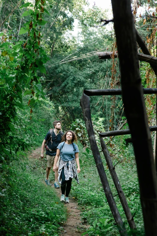 a couple of people that are walking in the woods, unsplash, renaissance, laos, adventure playground, ca, profile image