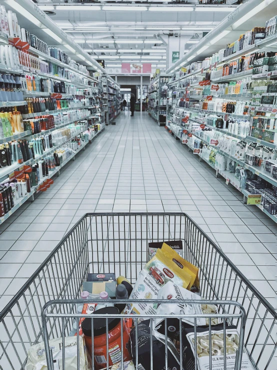 a shopping cart in a grocery store aisle, pexels, hyperrealism, 😭🤮 💔, victoria siemer, journalism photo, square