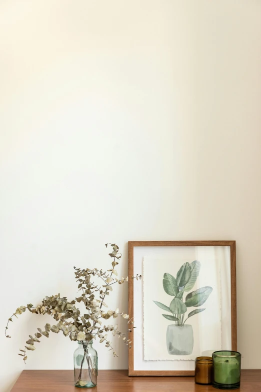 a wooden table topped with a vase filled with flowers, poster art, visual art, muted watercolor. minimalist, eucalyptus, low quality photo, framed in image