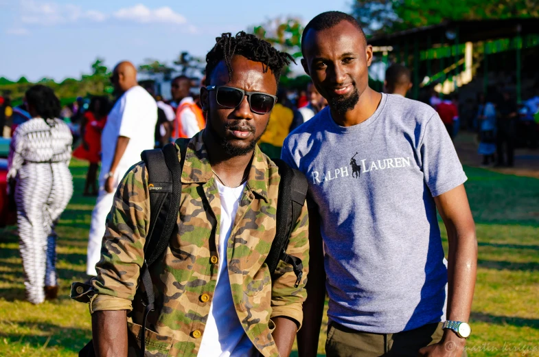a couple of men standing next to each other, by Ella Guru, pexels contest winner, music festival, very kenyan, avatar image, 15081959 21121991 01012000 4k
