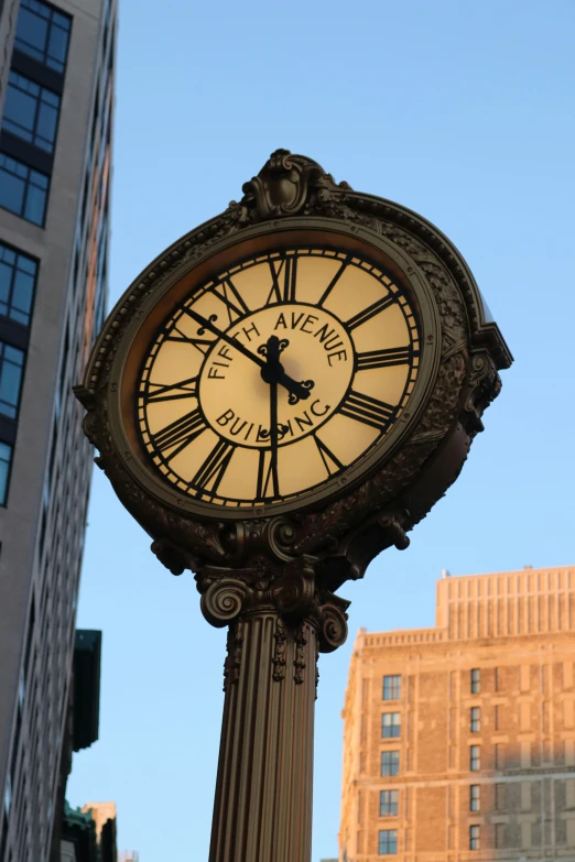 a clock on a pole in the middle of a city, by Greg Rutkowski, art nouveau, on madison avenue, 2 5 6 x 2 5 6 pixels, medium close shot, timestamp