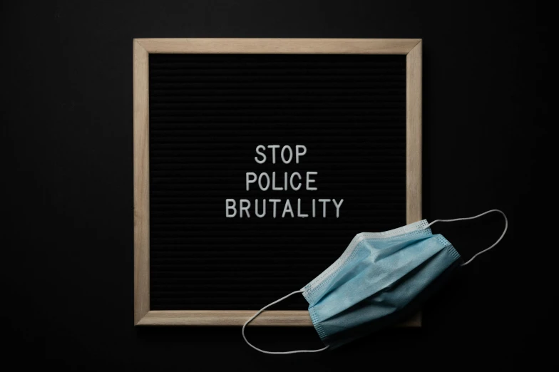 a sign that says stop police brutality, a picture, by Adam Marczyński, shutterstock, black facemask, instagram picture, 1 : 1 brutal design, 256x256