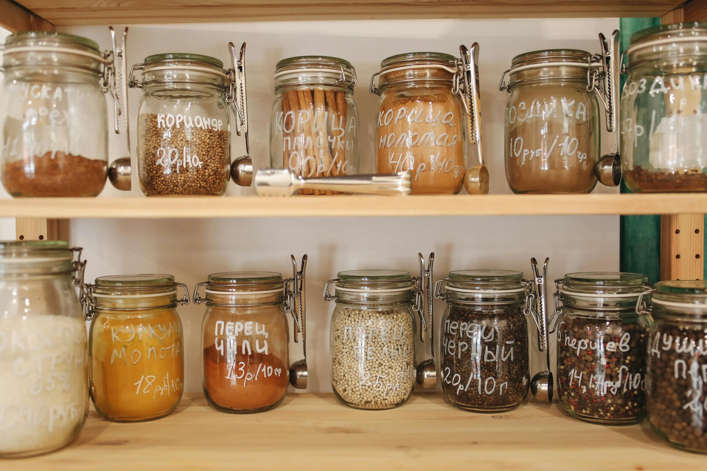 a bunch of jars that are on a shelf, pexels, graffiti, organic biomass, brown, recipe, etched inscriptions