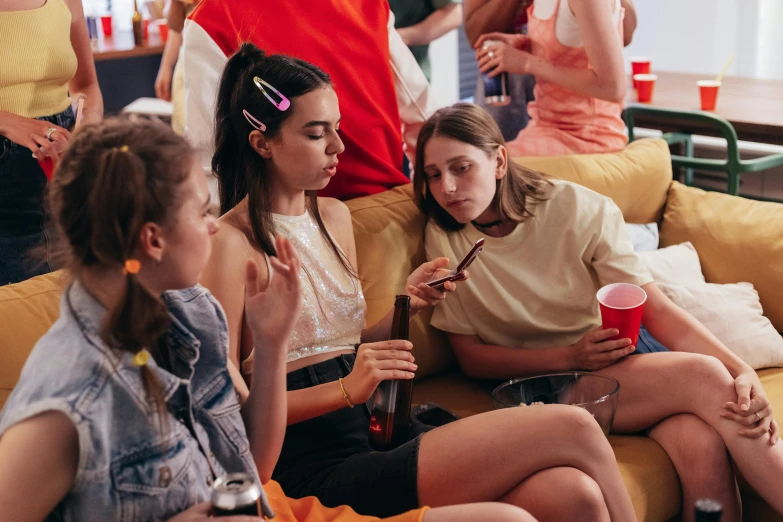 a group of women sitting on top of a couch, trending on pexels, drinking and smoking, teenage boy, tournament, profile image