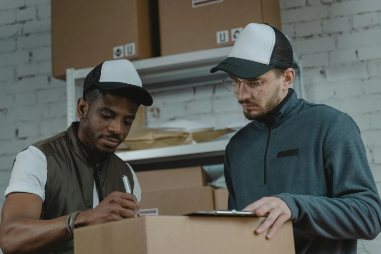 a couple of men standing next to each other, packaging, inspect in inventory image, thumbnail