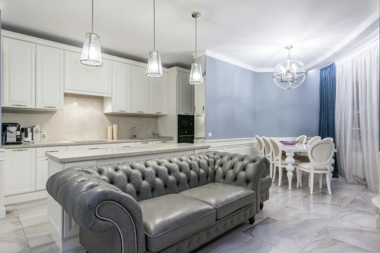 a couch sitting in a living room next to a kitchen, inspired by Alexander Roslin, white elegant baroque design, marble countertops, high quality image, ekaterina