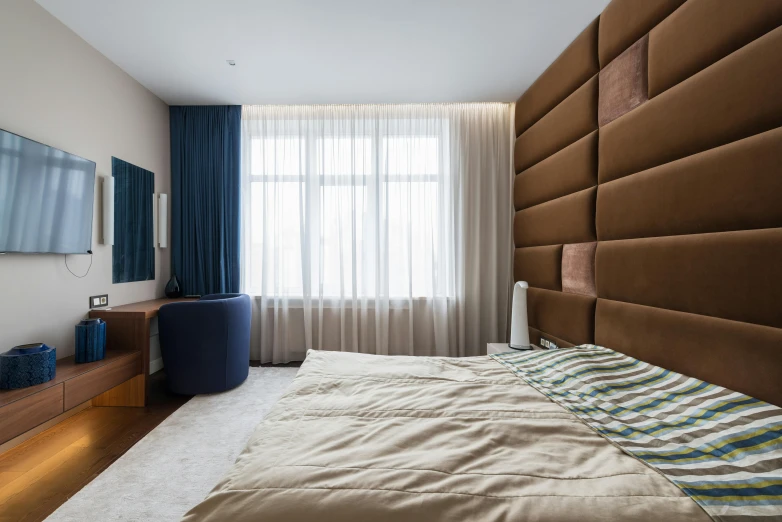 a bed room with a neatly made bed and a flat screen tv, a portrait, inspired by David Chipperfield, unsplash contest winner, baroque, brown red blue, neo kyiv, leather and suede, angled
