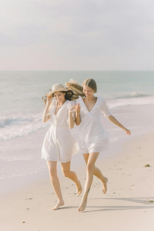 two women in white dresses running on the beach, unsplash contest winner, happy friend, wearing a linen shirt, vine, models