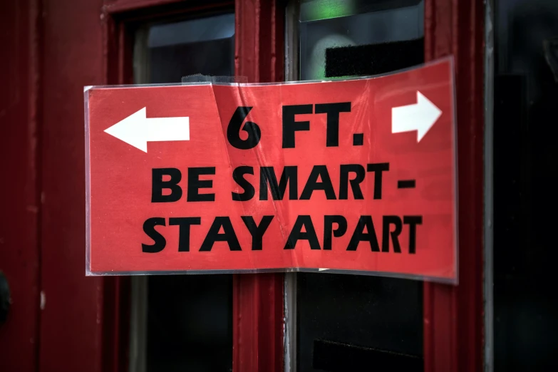 a red sign that says fit be smart stay apart, by Matt Stewart, pexels, six sided, ignant, always sunny in philadelphia, augmented reality