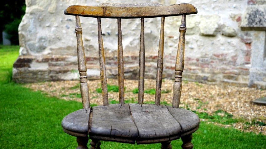 a wooden chair sitting on top of a lush green field, pexels contest winner, renaissance, photo of poor condition, bespoke, 1759, miscellaneous objects