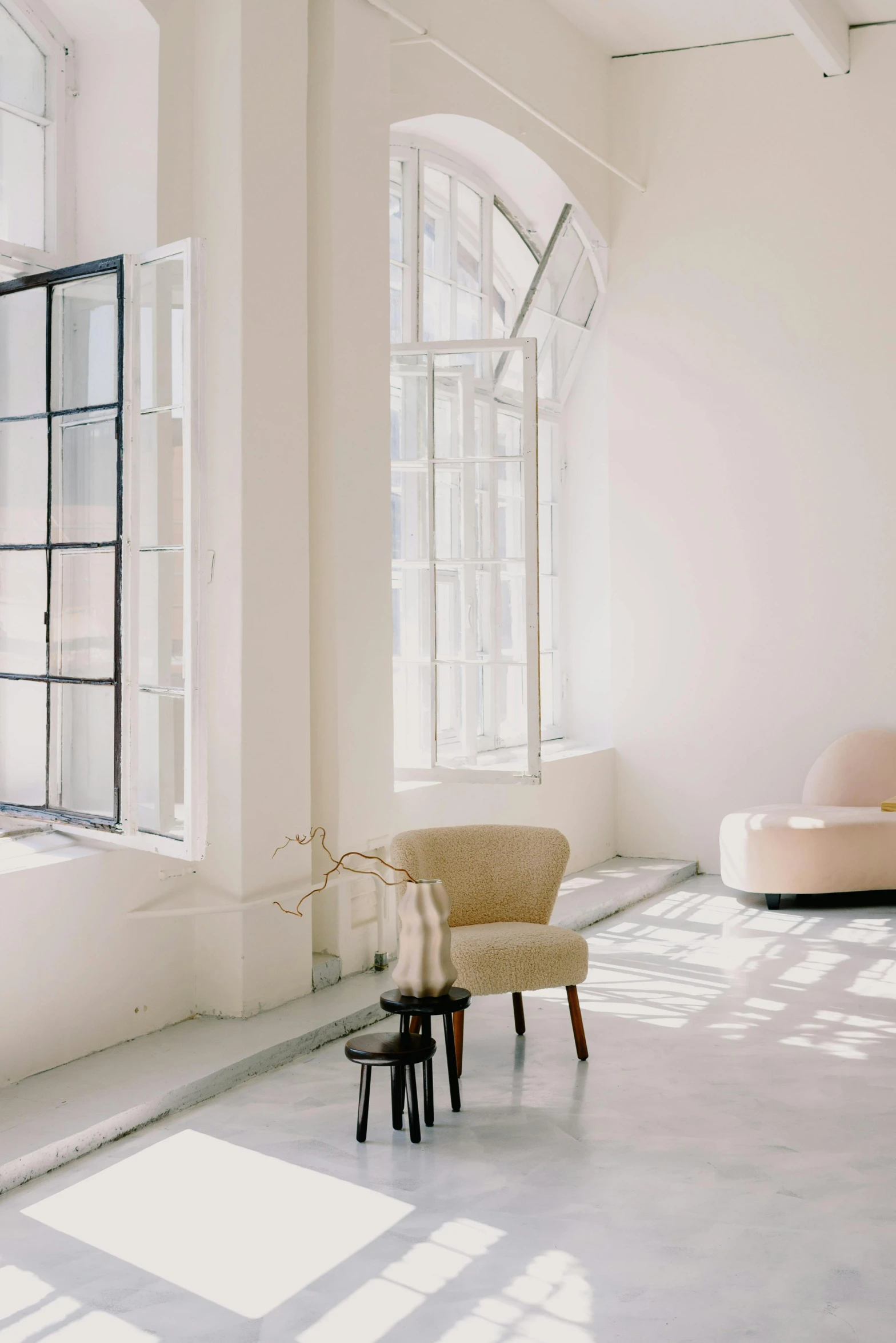 a living room filled with furniture and large windows, inspired by Constantin Hansen, trending on unsplash, light and space, white building, ethereal back light, boudoir, in front of white back drop