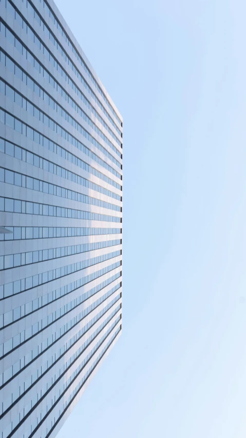 a couple of tall buildings next to each other, by Adam Rex, pexels contest winner, minimalism, sky blue, panels, 15081959 21121991 01012000 4k