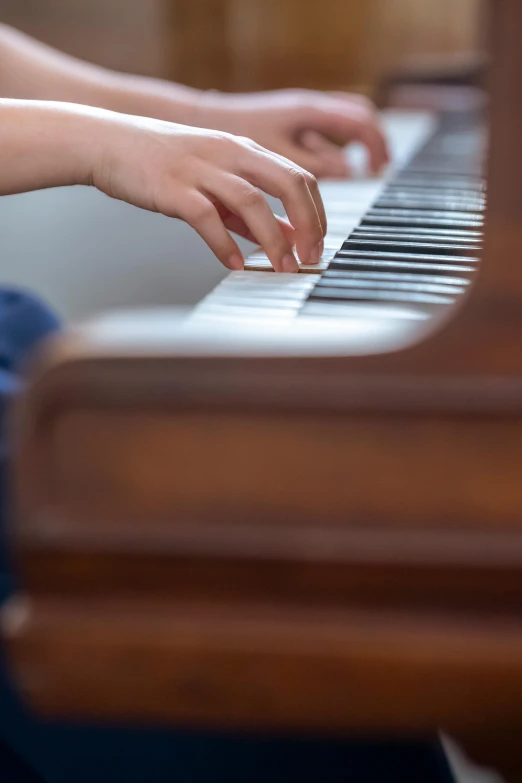 a close up of a person playing a piano, private school, paul barson, precious moments, stockphoto