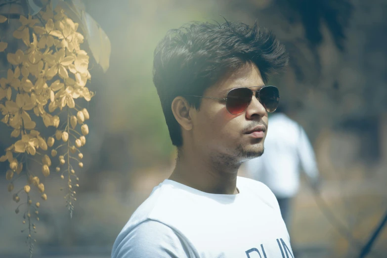 a man wearing sunglasses and a white shirt, a picture, by Saurabh Jethani, avatar image, male teenager, 8 0 mm photo, he is about 20 years old | short