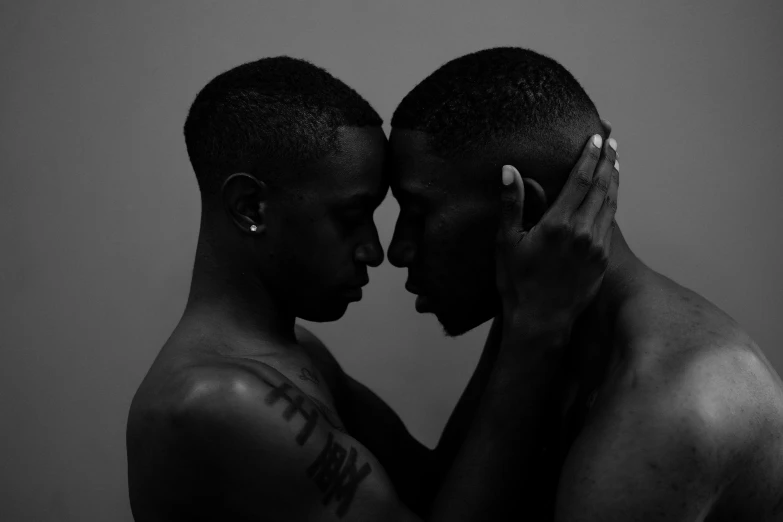 a couple of men standing next to each other, by Cosmo Alexander, pexels contest winner, visual art, black main color, tenderness, beautiful gemini twins portrait, unfinished