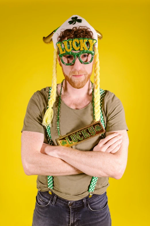 a man wearing a st patrick's day hat, an album cover, inspired by Bernd Fasching, hr ginger, yellow and green, pudica pose, subject= duck