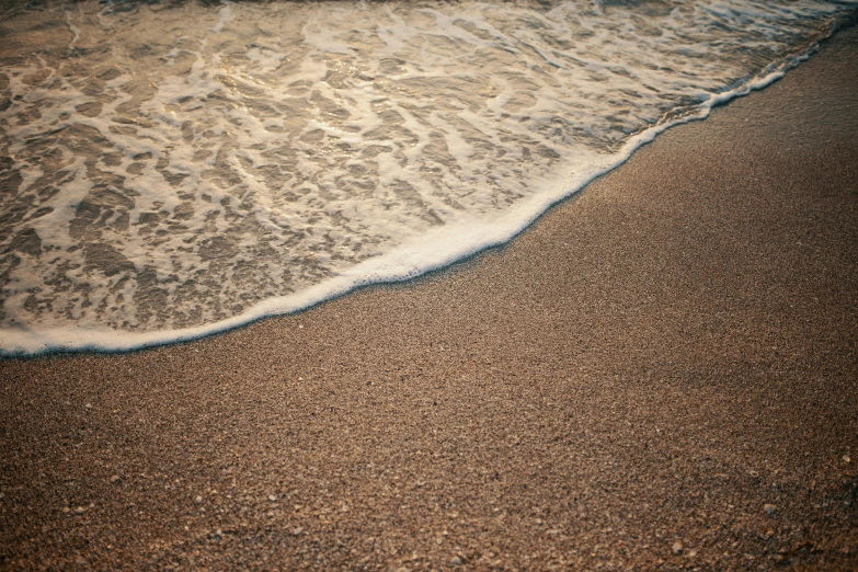 a surfboard sitting on top of a sandy beach, by Elsa Bleda, unsplash, renaissance, water ripples, muted brown, texture of sand, fine details 8k octane rendering