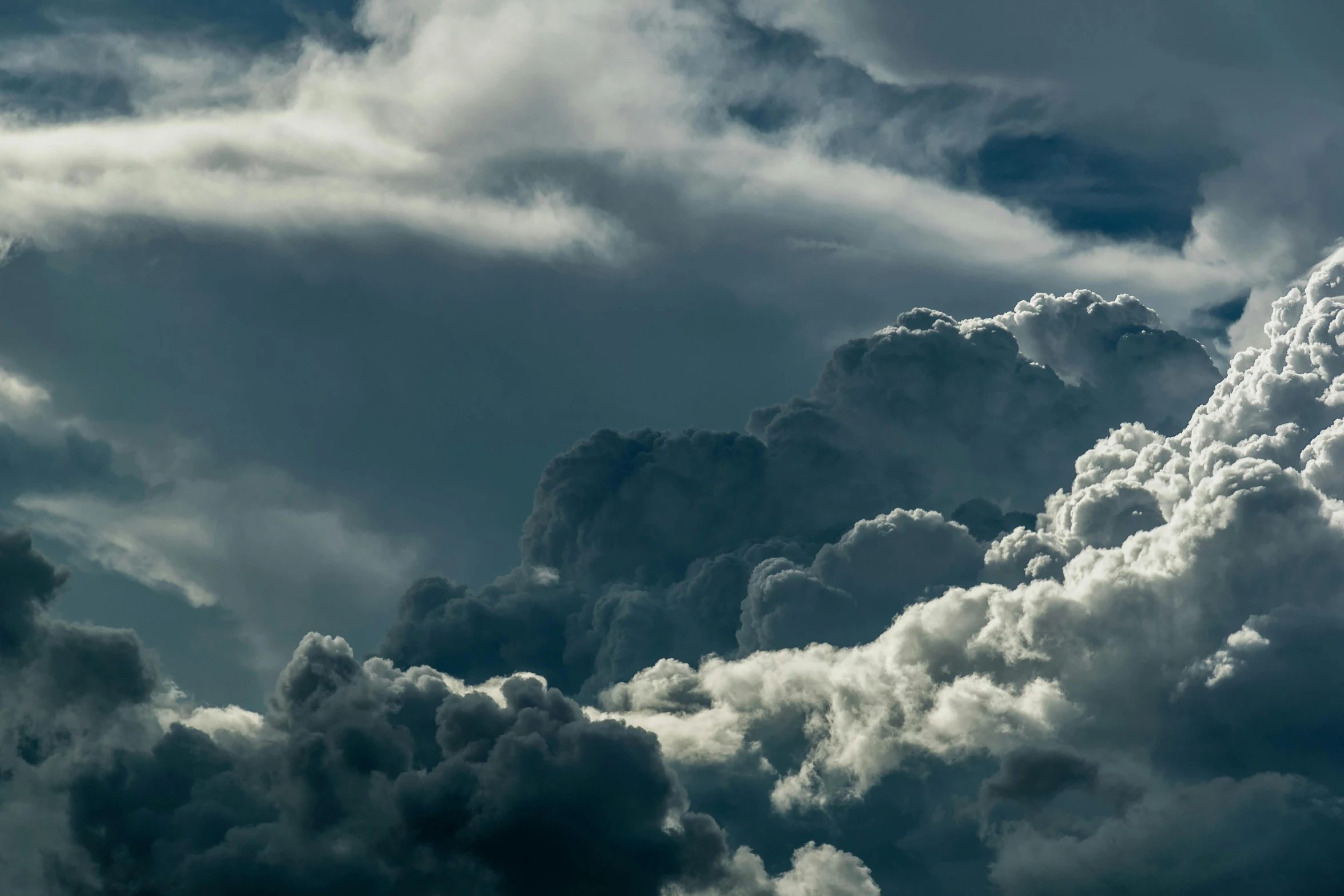 a jetliner flying through a cloudy sky, an album cover, pexels contest winner, baroque, dark mammatus cloud, steam clouds, hd footage, grey