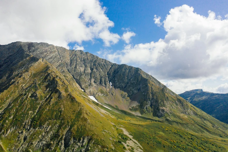 a view of the mountains from the top of a hill, by Werner Andermatt, pexels contest winner, les nabis, “ aerial view of a mountain, russia, high quality screenshot, structural geology