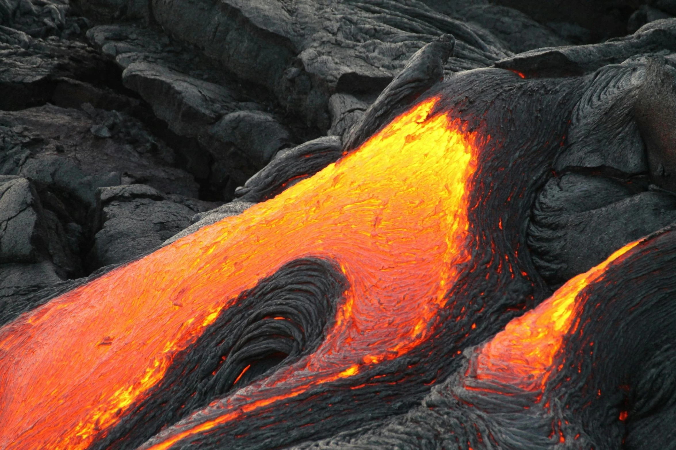 lava flowing down the side of a mountain, pexels contest winner, hurufiyya, circuitry. 8k 3d geology, avatar image, middle close up, iron smelting pits