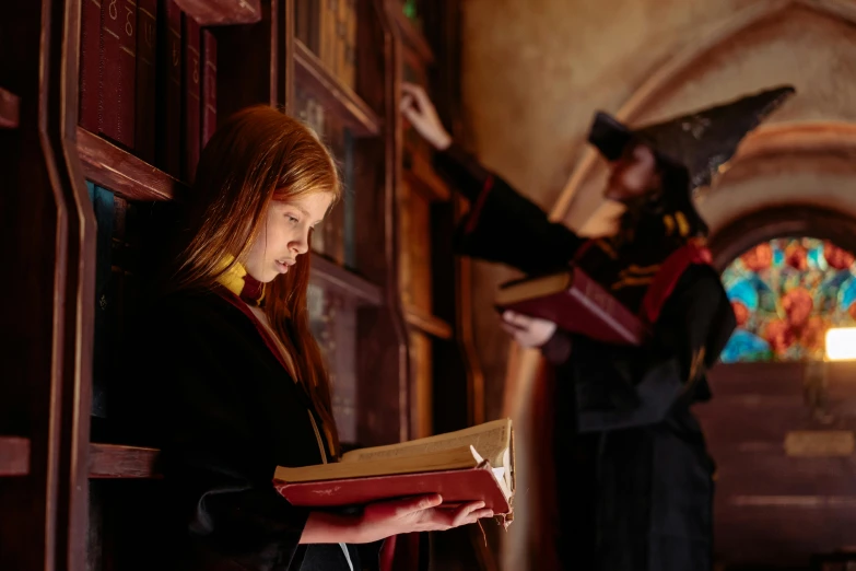 a woman reading a book in a library, a portrait, inspired by Hermione Hammond, pexels contest winner, outside the'school of magic ', medium shot of two characters, museum quality photo, aged 13