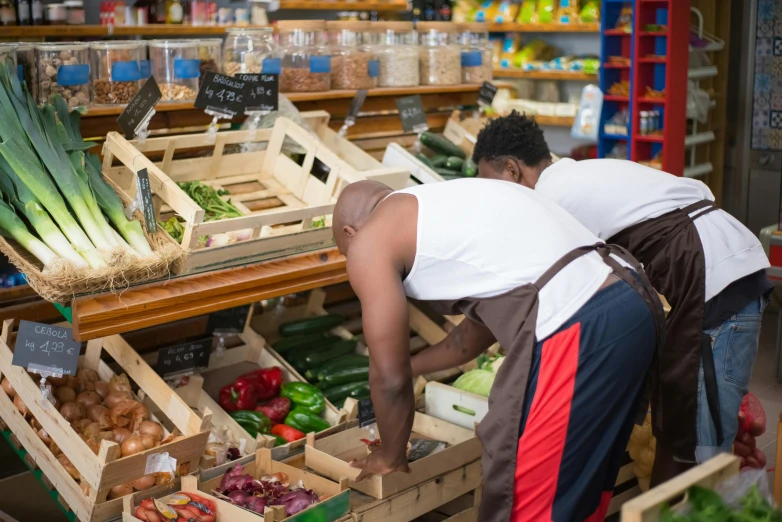 a couple of men standing next to each other at a produce stand, pexels, renaissance, unmistakably kenyan, stacking supermarket shelves, inspect in inventory image, thumbnail