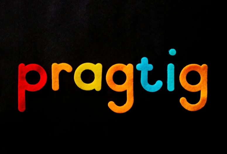 a close up of the word pragtig on a black background, by Brigette Barrager, bright vivid colours, margay, sweden, album cover