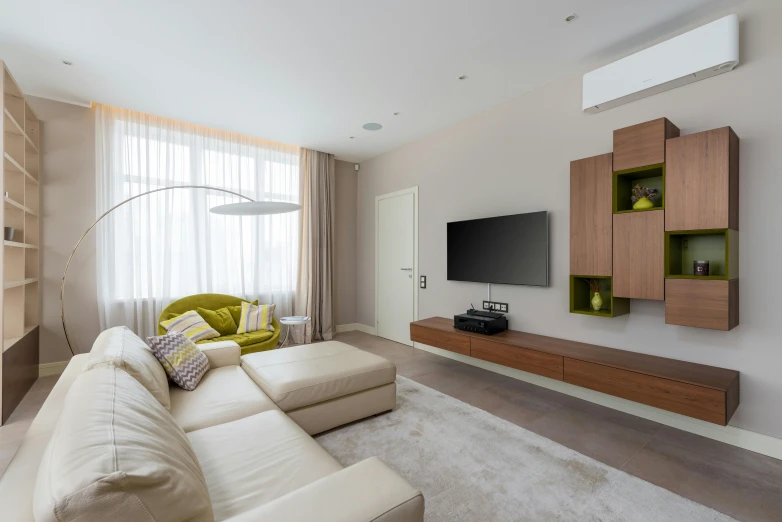 a living room filled with furniture and a flat screen tv, pexels contest winner, light and space, beige color scheme, modern minimalist f 2 0, small room, olive green and venetian red