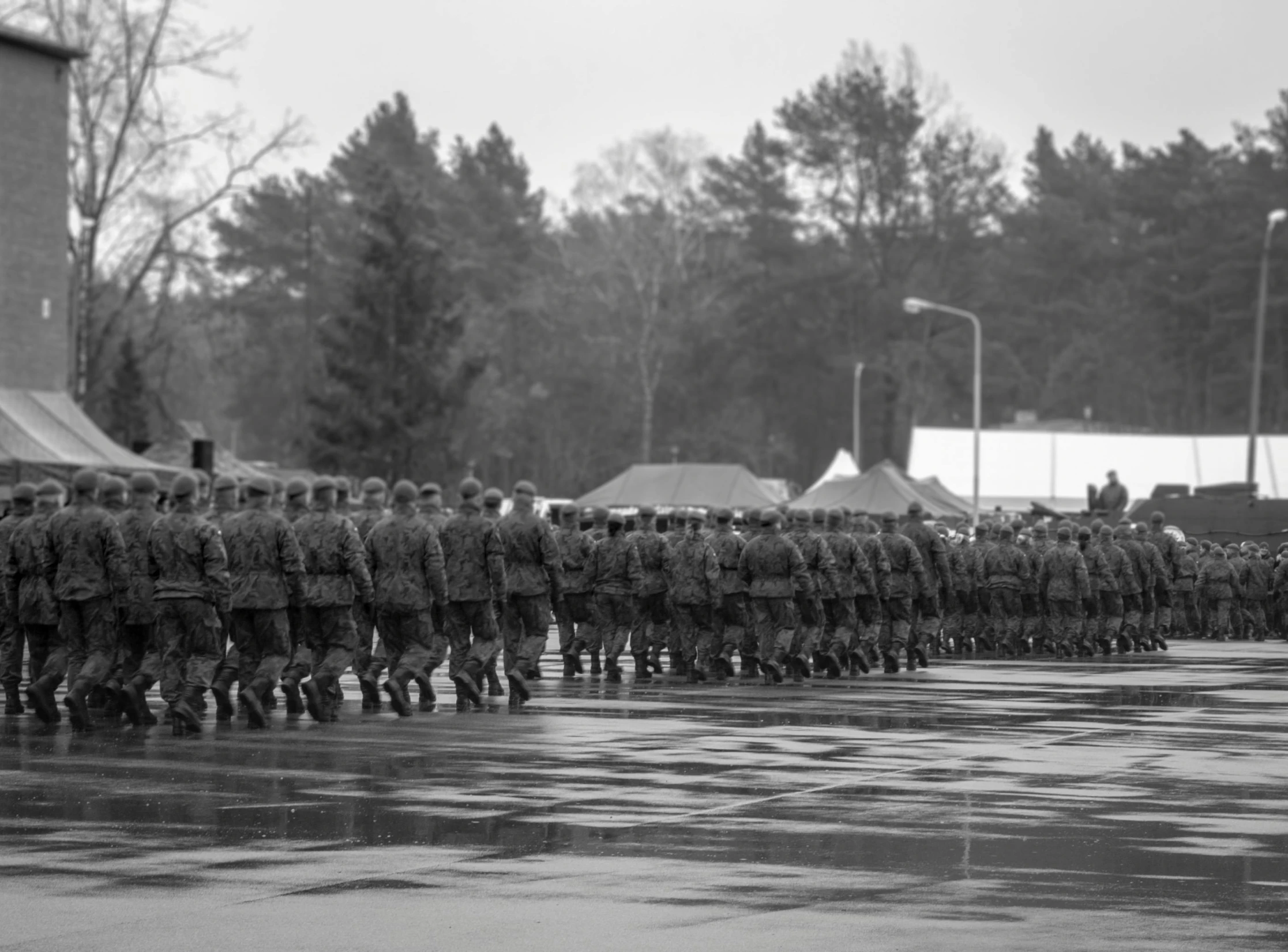 a black and white photo of a military parade, a photo, by Emma Andijewska, espoo, military base, single file, pentagon