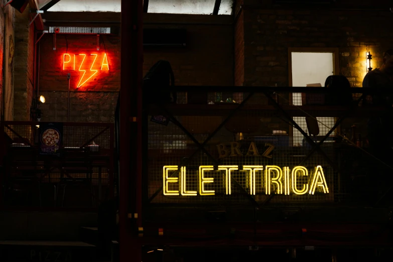 a neon sign on the side of a building, inspired by Elsa Bleda, pexels contest winner, photorealism, pizza on a table, electric motors, electric energy, helvetica