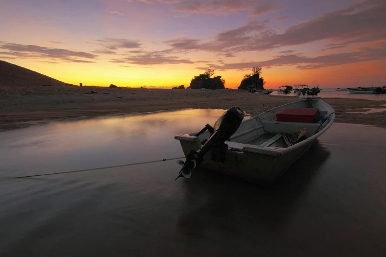 a small boat sitting on top of a sandy beach, a picture, by Basuki Abdullah, at twilight, slide show, fishing, abel tasman