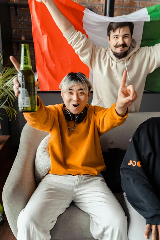 a group of people sitting on top of a couch, by Jang Seung-eop, pexels contest winner, neo-dada, holding a bottle of beer, gray haired, celebrate goal, ethnicity : japanese