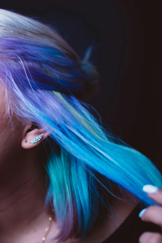 a woman with blue and purple hair brushing her hair, inspired by Elsa Bleda, trending on pexels, rainbow accents, colorful]”, blue neon, ombre