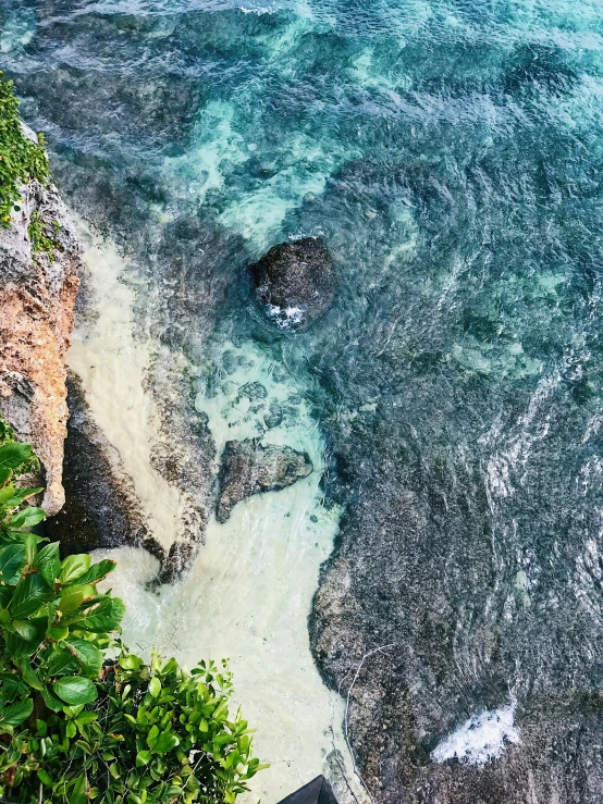 a view of the ocean from the top of a cliff, pexels contest winner, sumatraism, sapphire waters below, dynamic closeup, standing on a beach in boracay, slide show