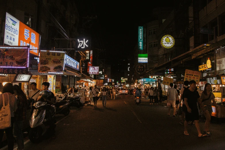 a group of people walking down a street at night, signboards, patiphan sottiwilai, fan favorite, ultra wide