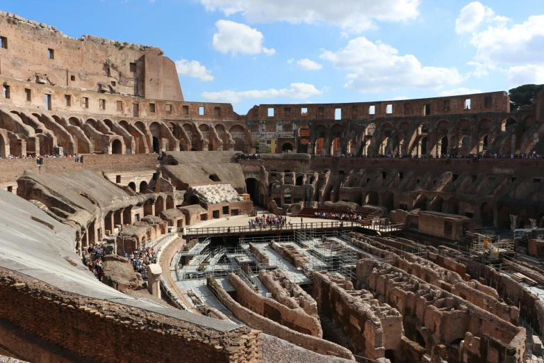 the interior of the colossion in rome, italy, pexels contest winner, fan favorite, circular towers, ben hur, promo image