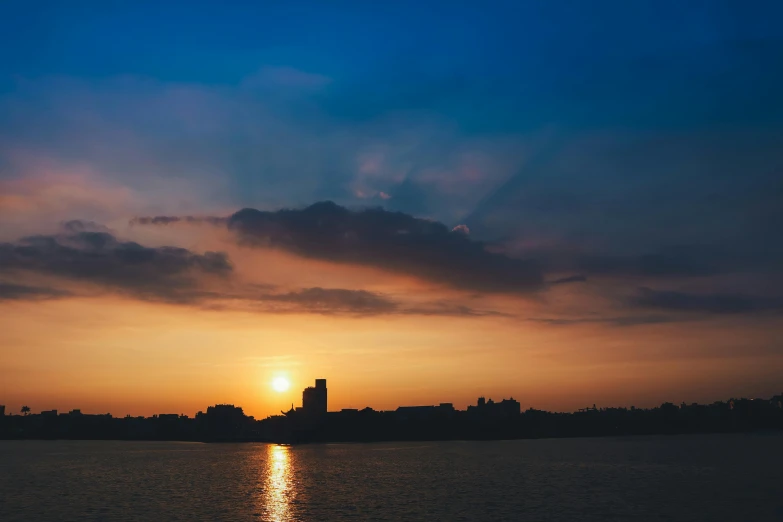 the sun is setting over a body of water, pexels contest winner, brooklyn background, evening sky, 1 4 9 3, fan favorite