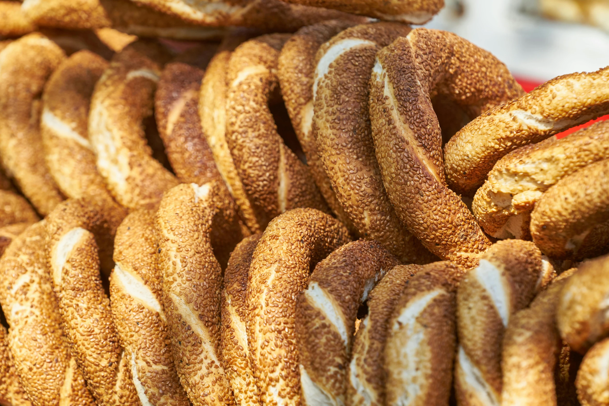 a pile of pretzels sitting on top of each other, by Arthur Sarkissian, trending on pexels, art nouveau, mediterranean, close up of iwakura lain, turkey, grain”