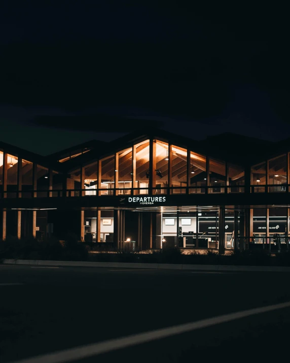 a building that is lit up at night, unsplash contest winner, hurufiyya, gourmet restaurant, kahikatea, black windows, rustic yet enormous scp (secure