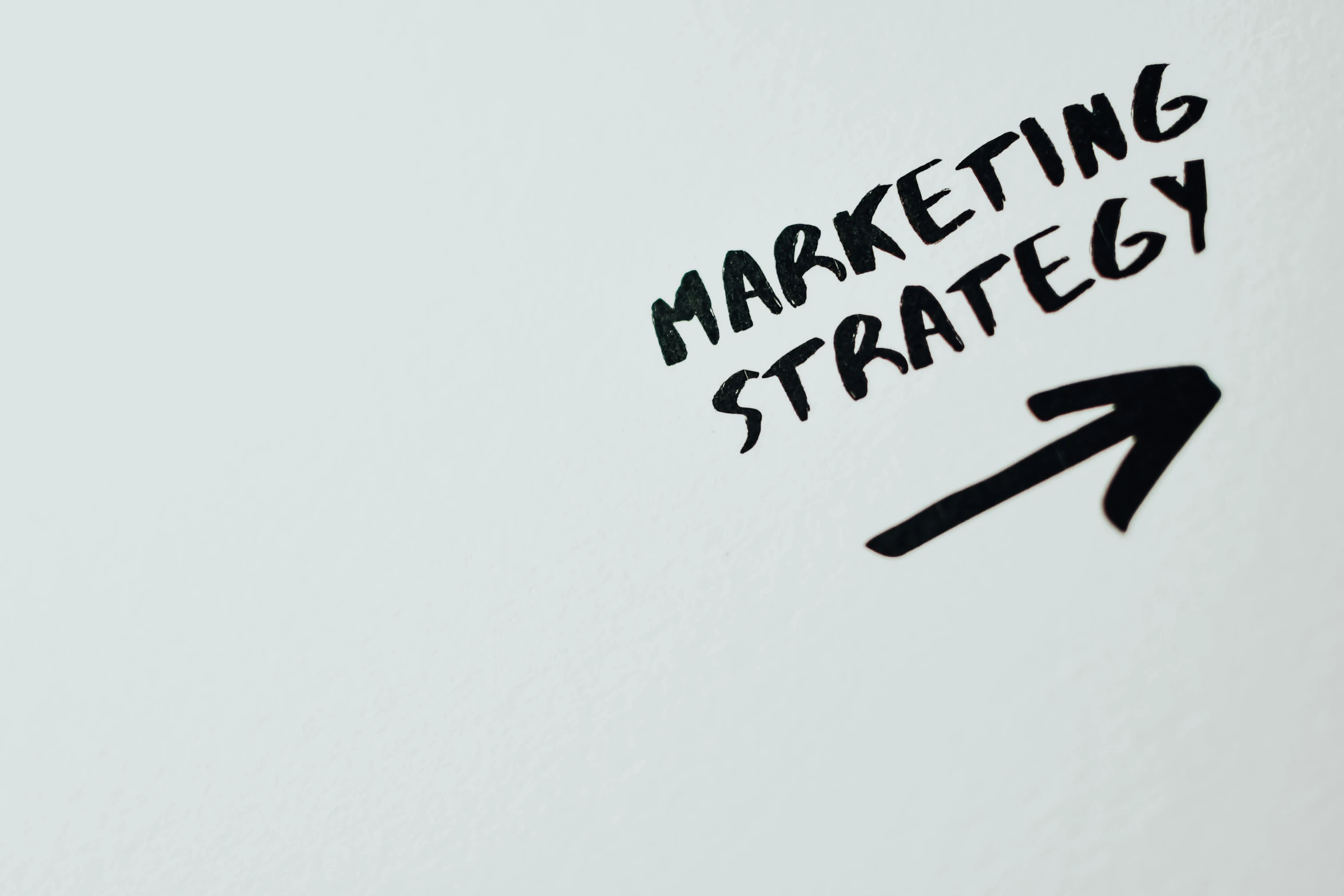 a white board with the words marketing strategy written on it, by Daniel Lieske, trending on pixabay, conceptual art, 3 4 5 3 1, studio shoot, seen from straight above, dug stanat