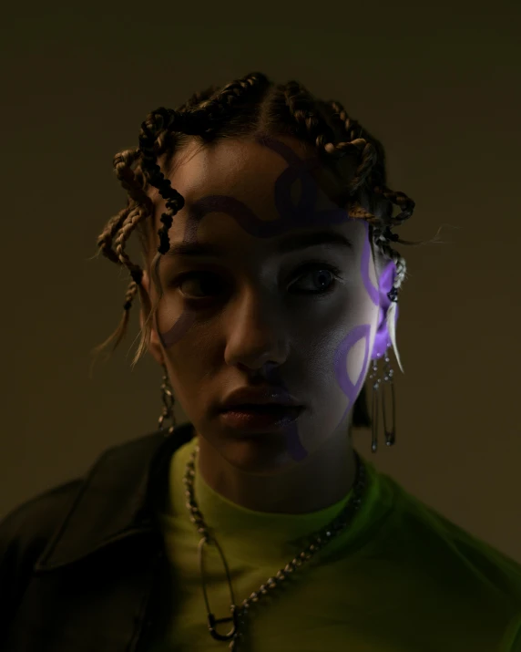 a woman with dreadlocks and a green shirt, an album cover, inspired by Elsa Bleda, trending on pexels, realism, with glowing purple eyes, tron angel, an epic non - binary model, ashteroth