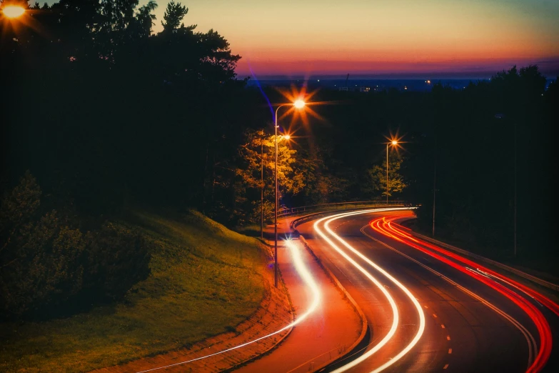 a long exposure photo of a highway at night, a picture, unsplash contest winner, golden hour 4k, ilustration, distant town lights, instagram photo